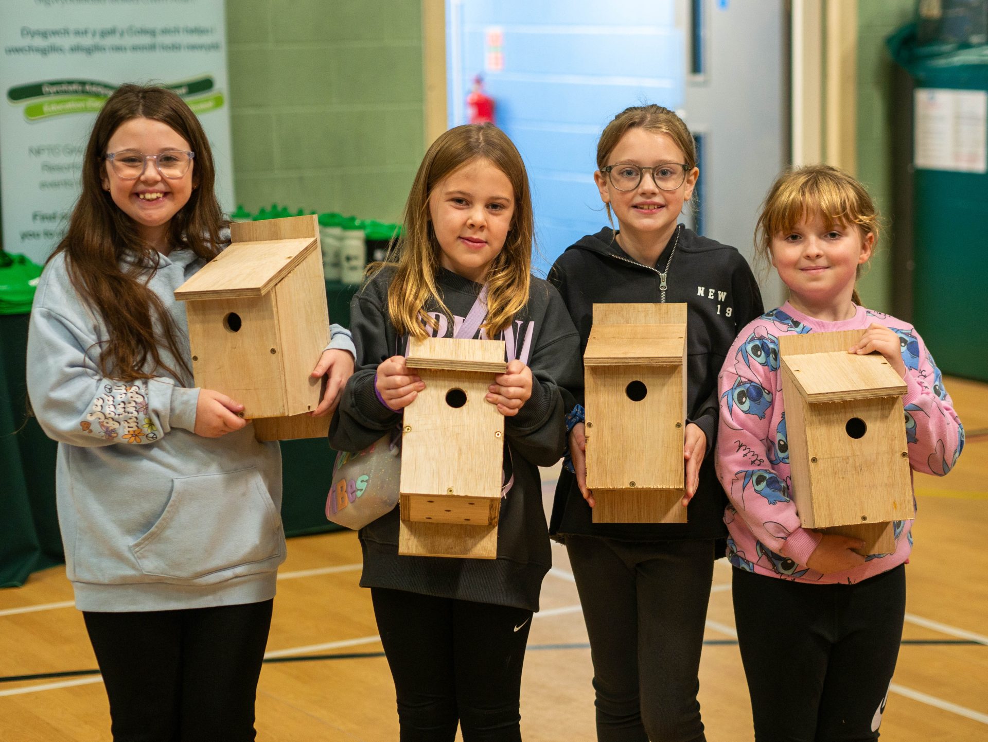 Children from the Afan Valley with freshly made bird boxes at Cymmer Fitness Centre